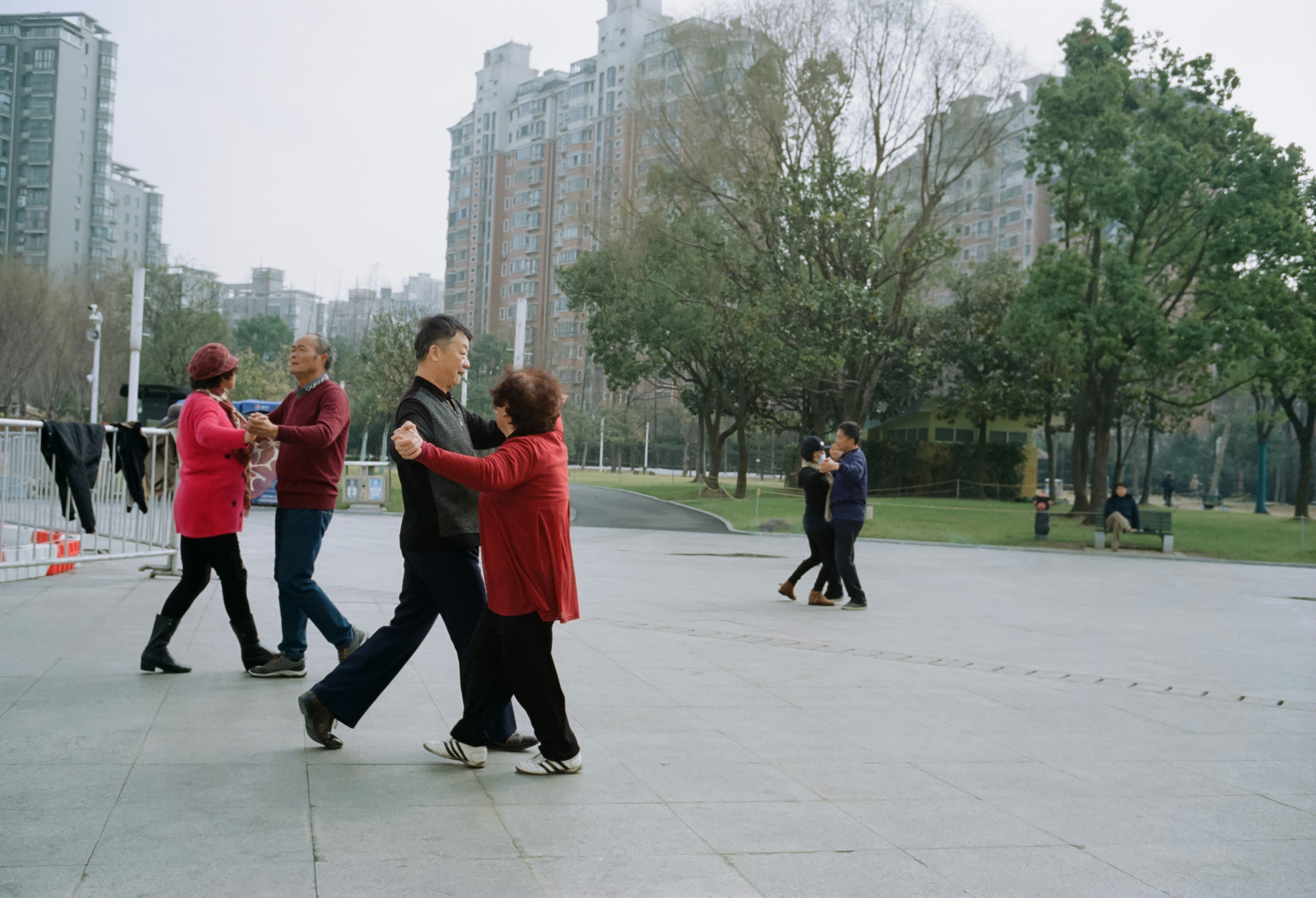 people walking on white floor tiles during daytime